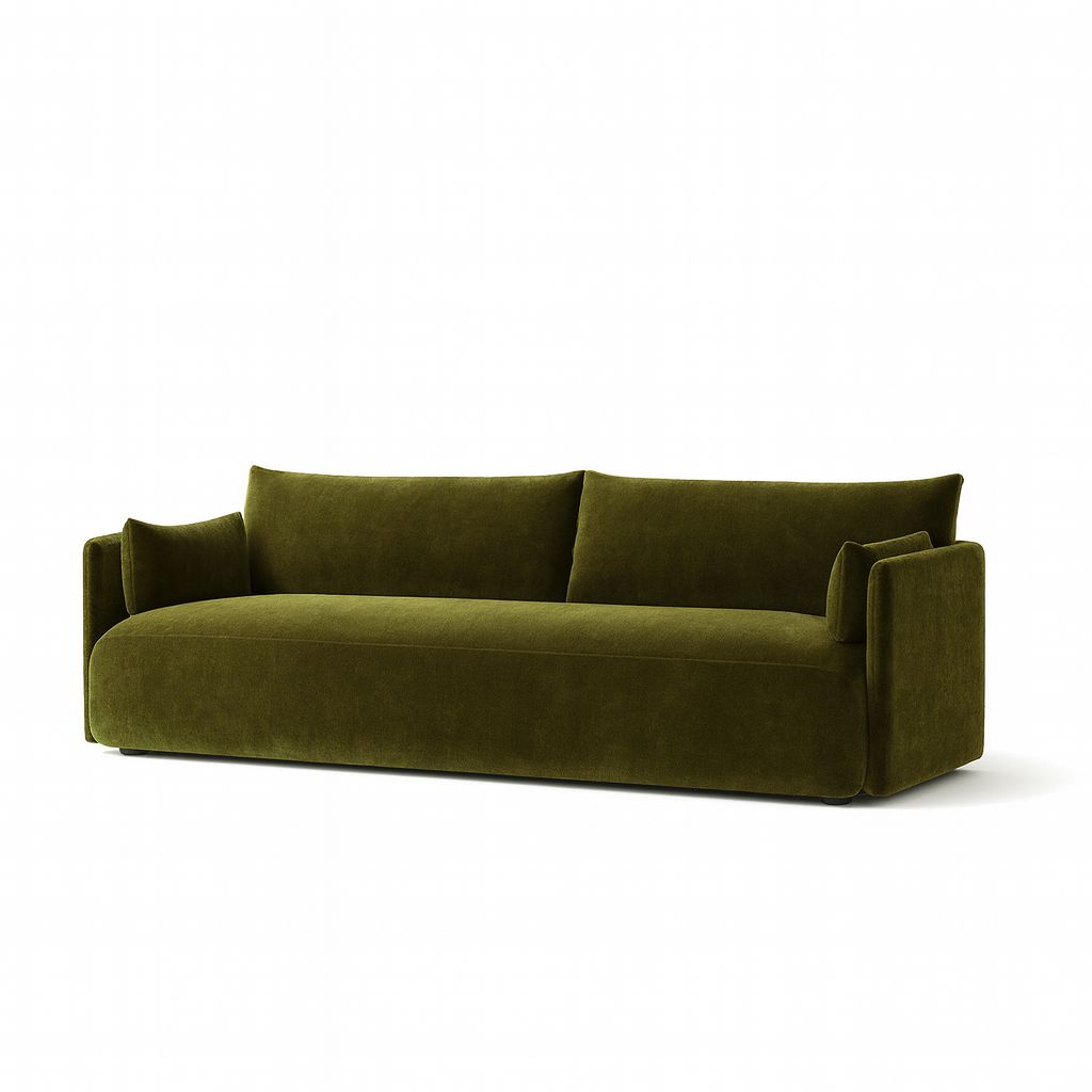 Luxurious green velvet sofa by Porters Gray, showcasing premium luxury furniture designs.